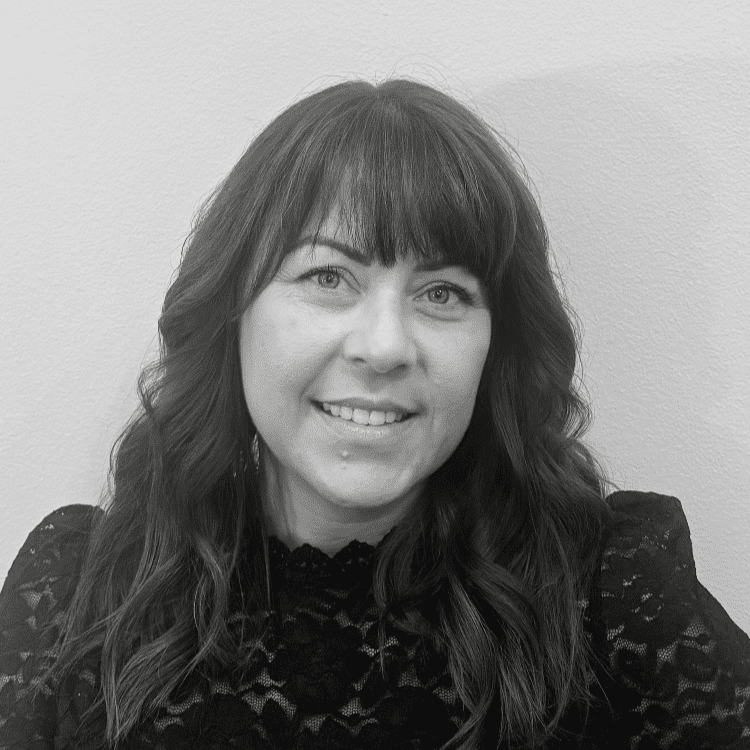 Portrait of Amanda, a professional stylist at Jungle Red Salon, showcasing their expertise and style.