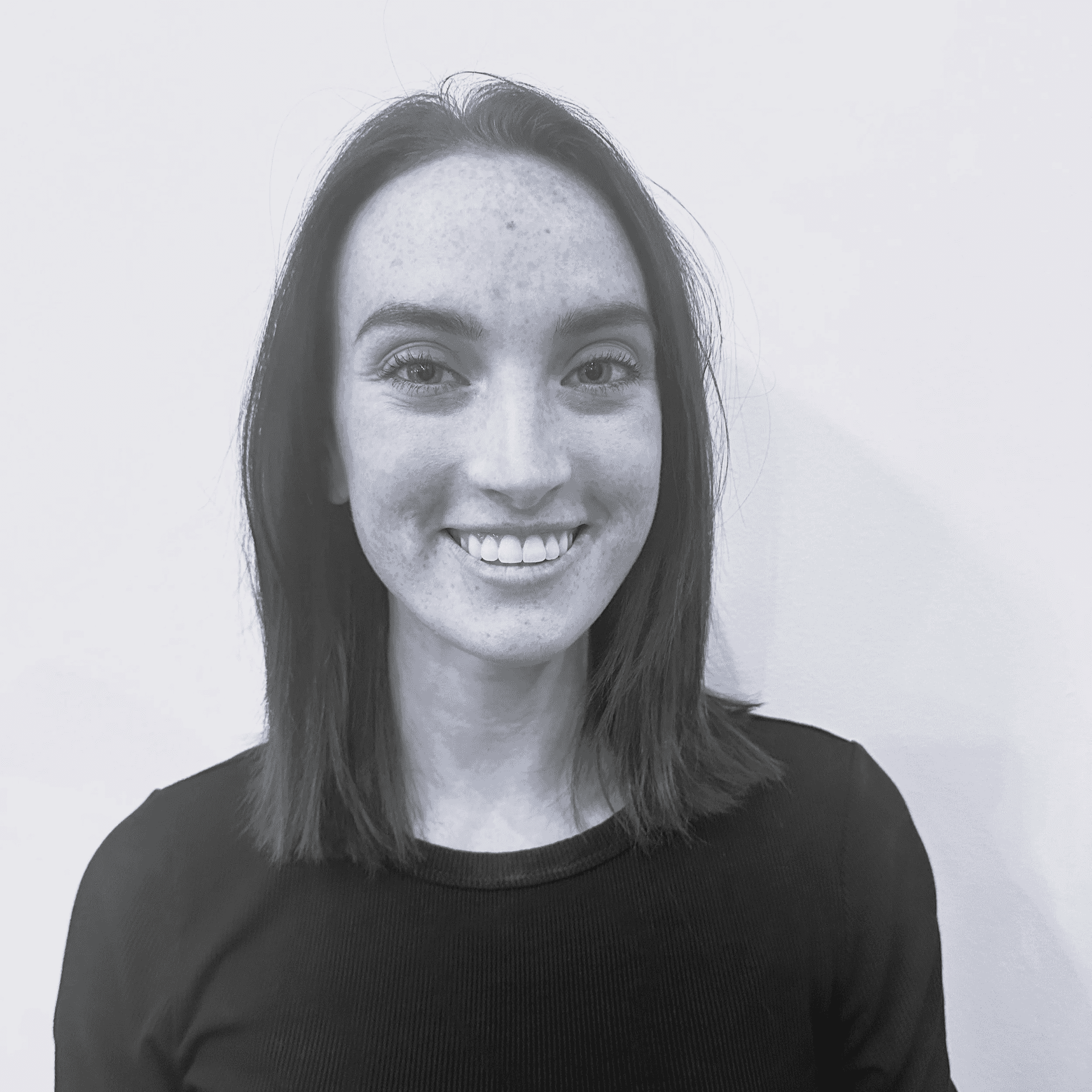 Portrait of Jordy, a professional stylist at Jungle Red Salon, showcasing their expertise and style.