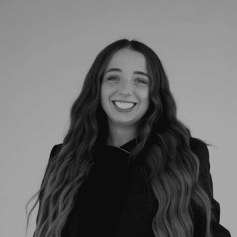 Portrait of Morgan, a professional stylist at Jungle Red Salon, showcasing their expertise and style.